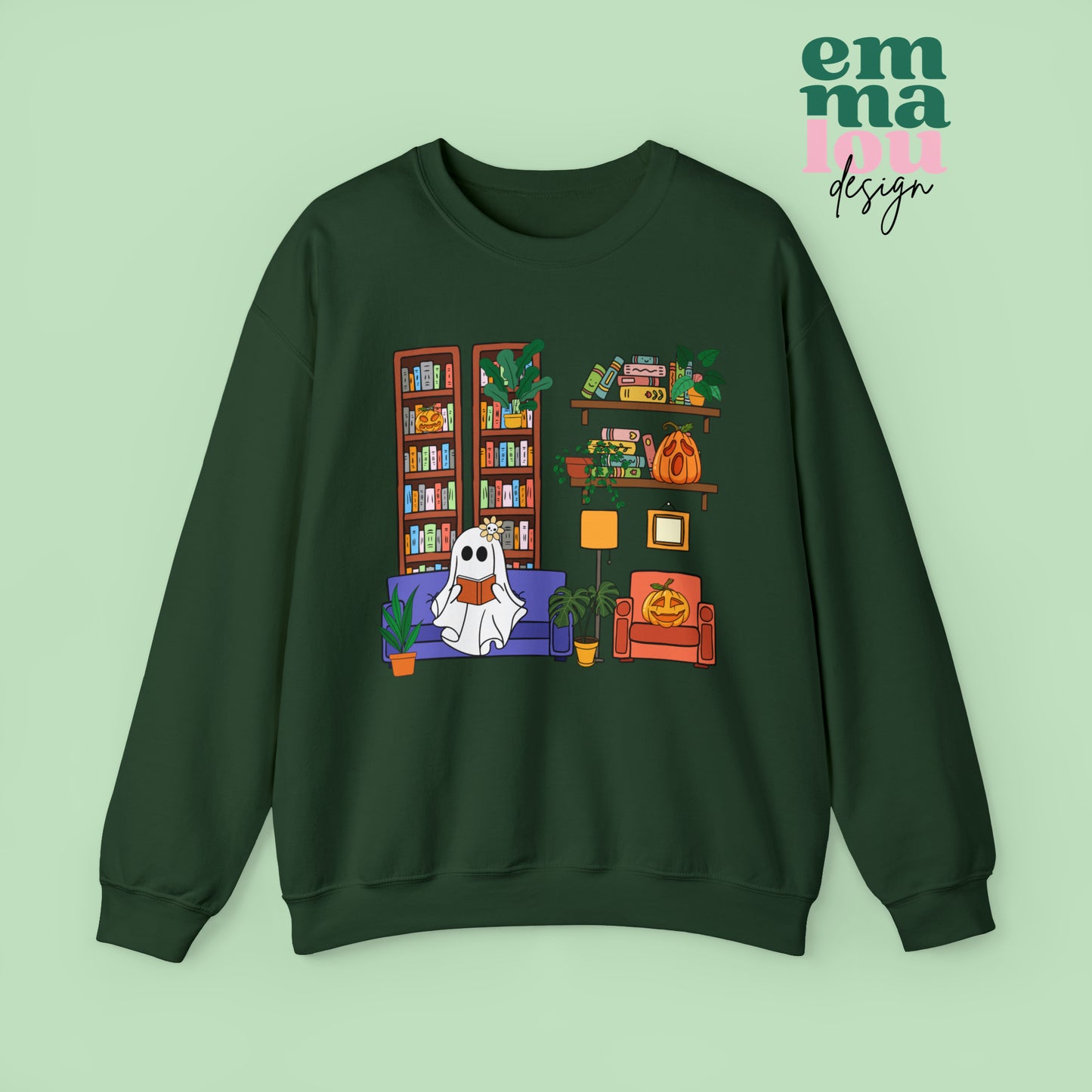 Forest Green Gildan Crewneck Sweatshirt Featuring a Graphic design featuring a cute ghost with a floral bow reading on a purple couch surrounded by cute house plants and 2 bookcases and shelves with books